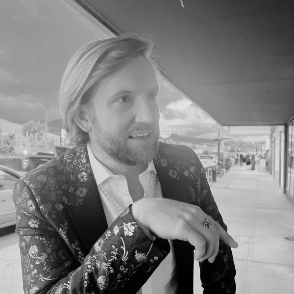 Image of person outside smiling.